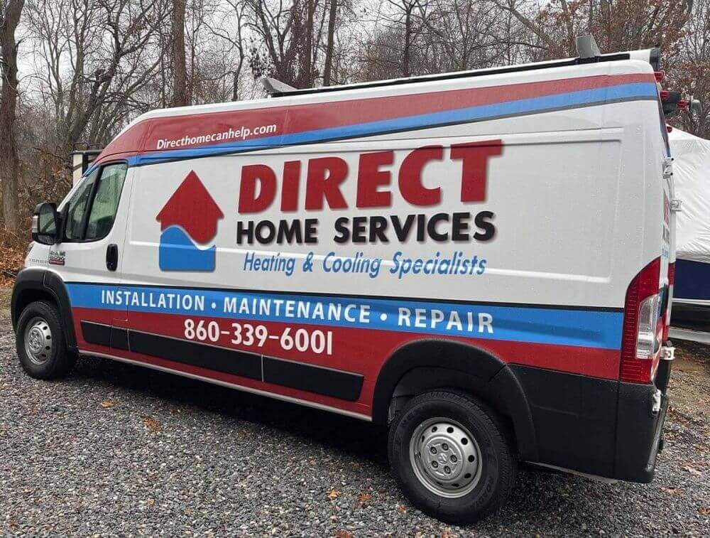 Direct Home Services Heating & Cooling Specialists service van parked outdoors, representing AC maintenance in Durham CT and surrounding areas. The vehicle shows company branding and contact details, including phone number (860) 339-6001, used by technicians traveling to homes for air conditioning maintenance and service. This image reflects local HVAC service availability in Durham, Connecticut, where homeowners rely on regular AC maintenance to keep systems running efficiently. Direct Home Services provides residential air conditioning maintenance, repair, and inspection services across the Durham CT area to support home comfort and system performance.